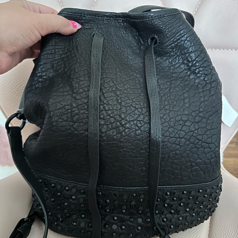 Black Textured Leather Drawstring Bag by She + Lo